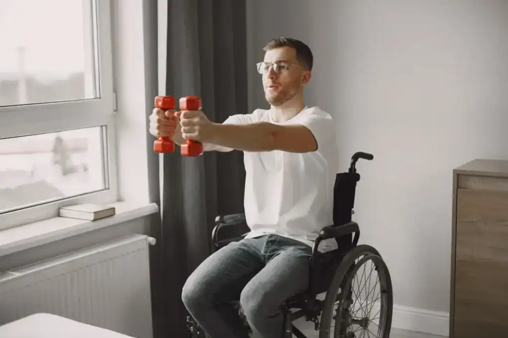 Empowering Weight Loss: A Comprehensive Guide for Individuals with Disabilities 1 Image of man doing exercise in his wheelchair to aid weight loss Oxfordshire